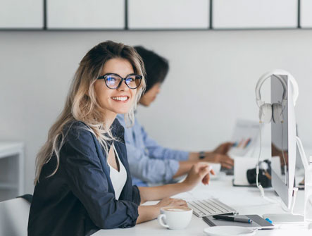 Image showing a female using a computer to access her Stone Account
