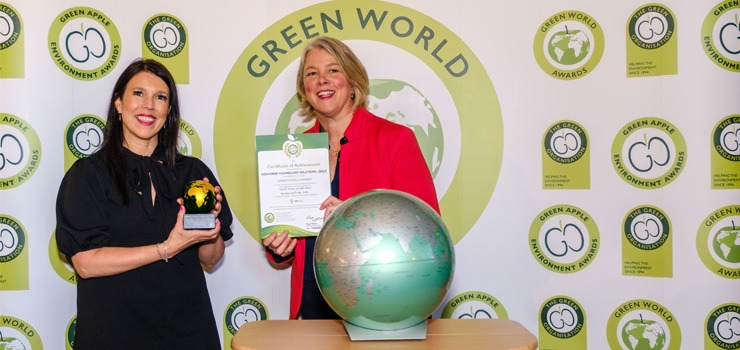 Dionne Barlow of Converge UK collecting the Green Apple Award for 2026