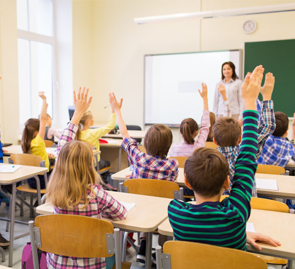 Photo of schoolchildren in a classroom setting