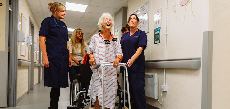 A patient with nurses in hospital