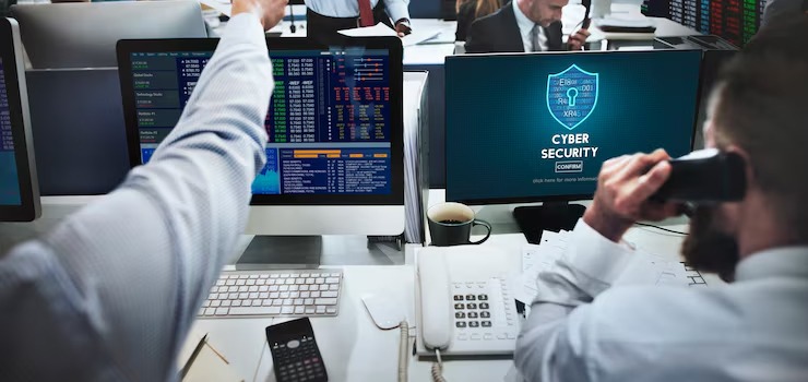 People at work using IT equipment secured by Converge's Infrastructure Security service