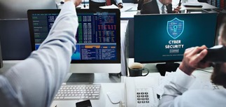 People at work using IT equipment secured by Converge's Infrastructure Security service