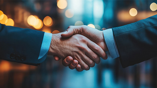 2 Business people shaking hands