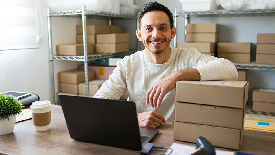 A person in their office using a laptop from Converge Technology Solutions