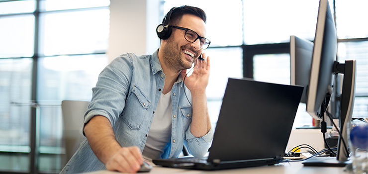 A person on a call with an IT recycling customer